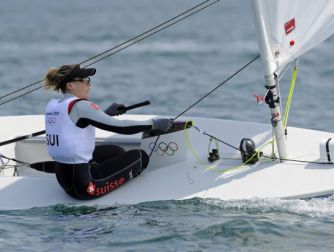 epa03319554 Switzerland's Nathalie Brugger practises in the Laser Radical class in Weymouth, Britain, 27 July 2012. Weymouth is hosting the sailing competition for the London 2012 Olympic Games.  EPA/GERRY PENNY